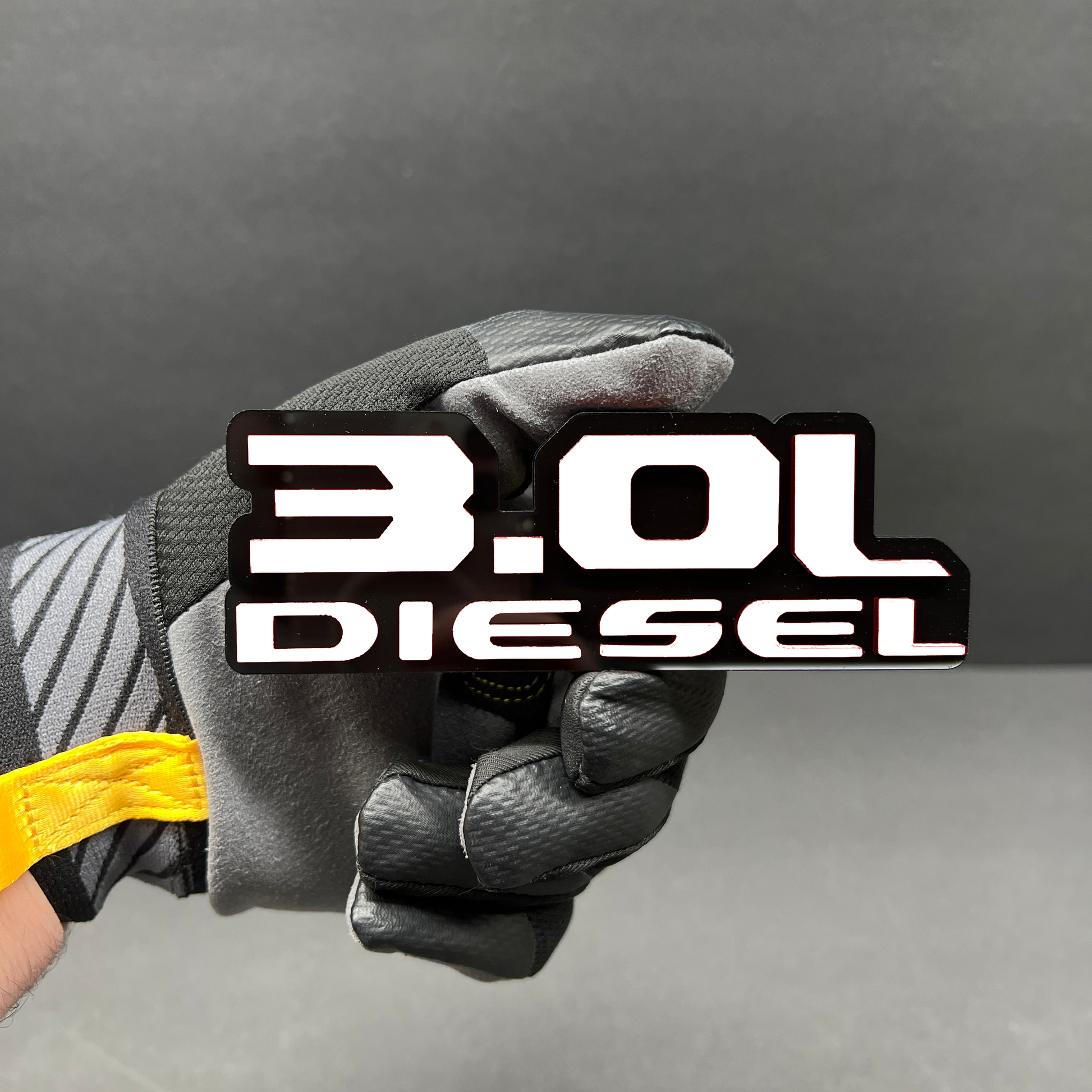 tailgate 3.0L diesel badge on lifted truck offroad build