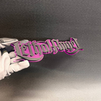 Custom Lethal Angel text car badge with layered pink and black finish