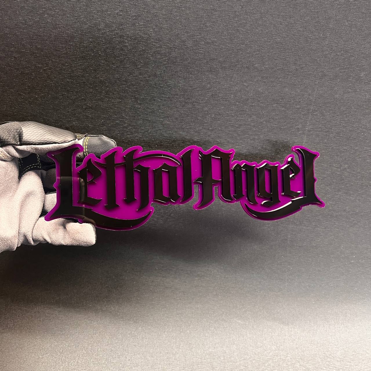 Lethal Angel car badge fender emblem in black and pink gothic text style