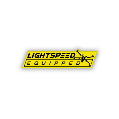 Spaceship-themed car fender badge with brushed metal finish