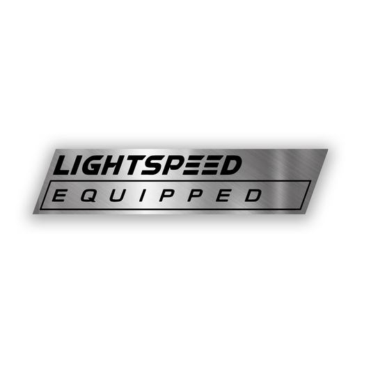 Lightspeed Equipped engraved silver car badge with futuristic lettering