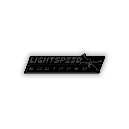 Space-inspired automotive emblem with black engraved details