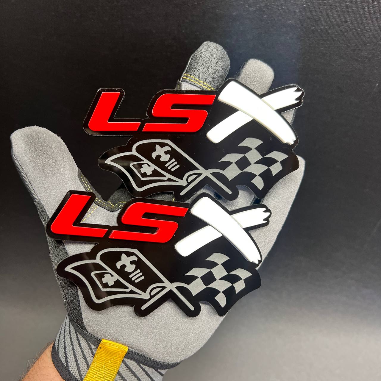 Red and white LSX crossed racing flags automotive fender emblem