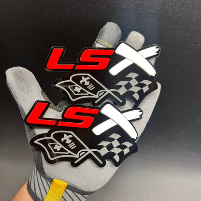 Red and white LSX crossed racing flags automotive fender emblem