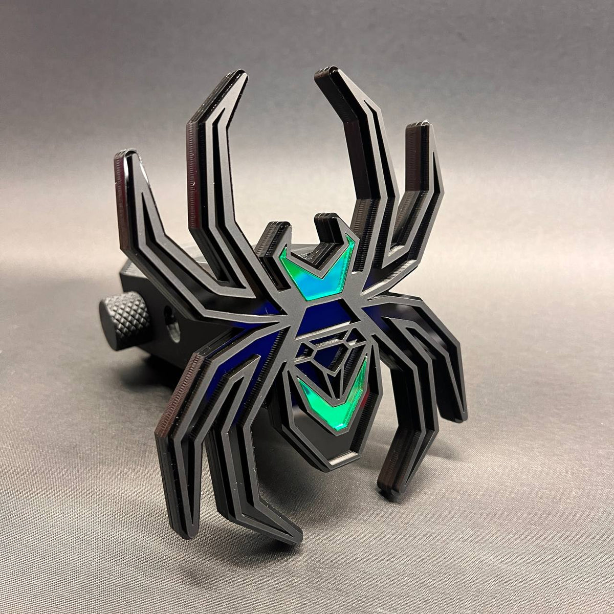 Matte black Black Widow spider hitch cover with poison green accents for cars and trucks.