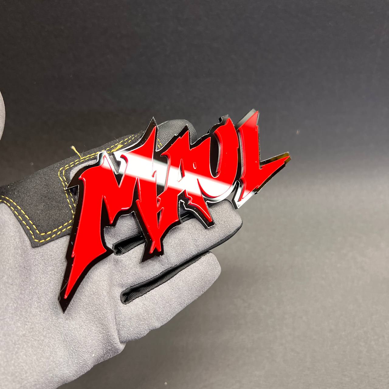 Custom MAUL car exterior decal with aggressive red lettering