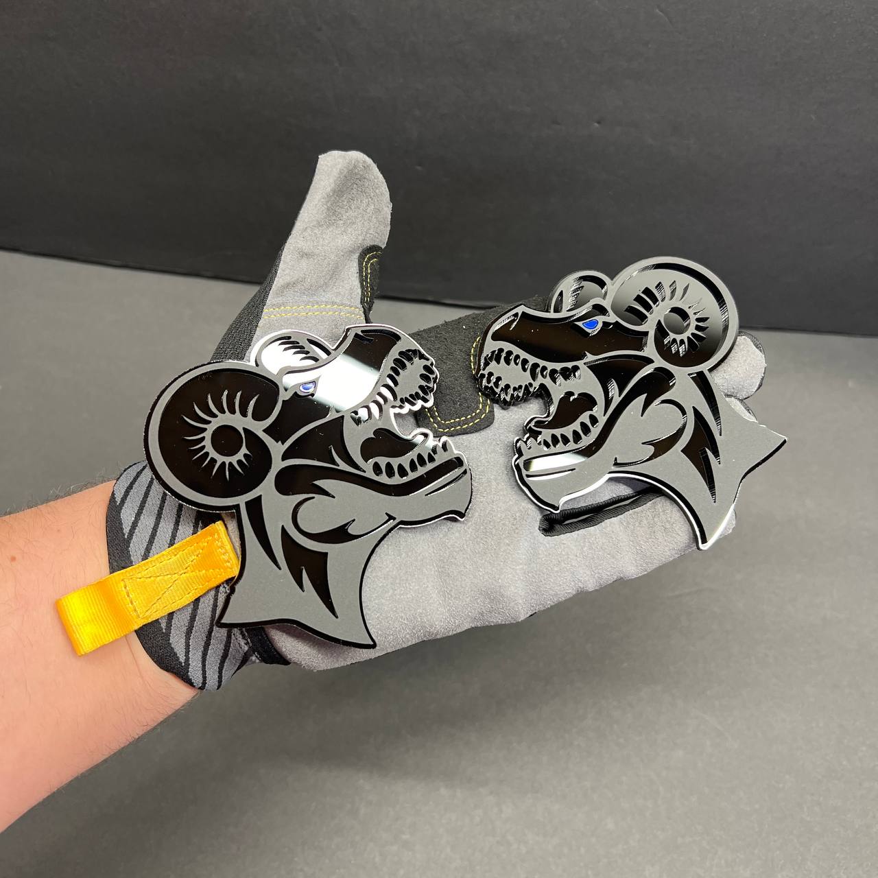 Mega Zilla Ram Horns car badge in glossy black finish with aggressive monster design.