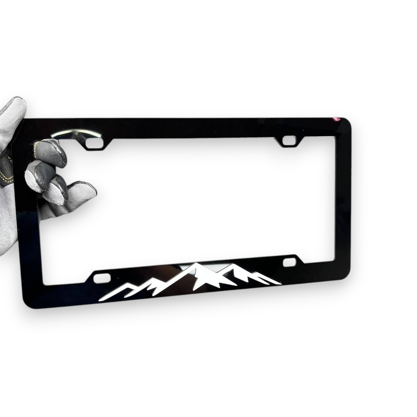 Glossy black acrylic mountain license plate frame for adventure trucks