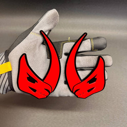 Red and black Mudhorn car badge emblem with aggressive horned design