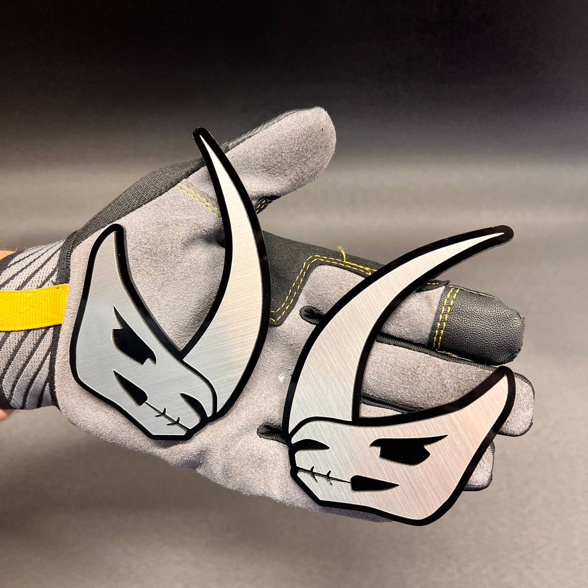 Silver and black Mudhorn truck badge for exterior automotive customization