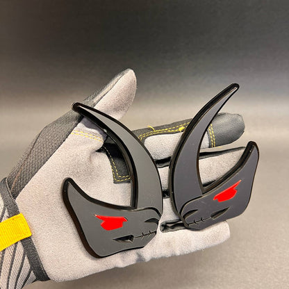 Brushed silver Mudhorn fender badge with glossy black outline