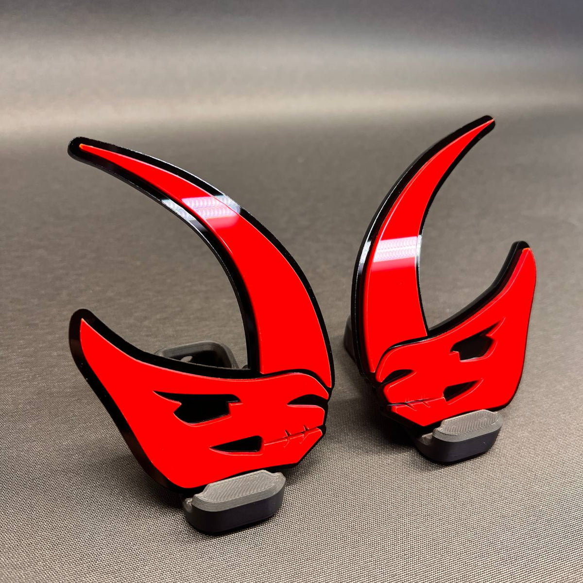 Mudhorn auto emblem featuring a bold horned skull style design