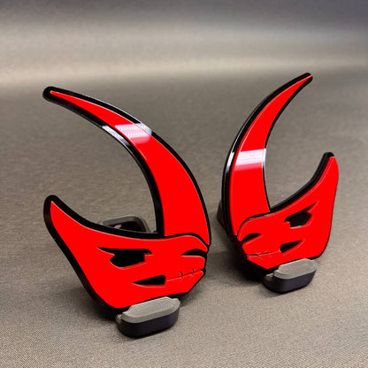 Mudhorn auto emblem featuring a bold horned skull style design