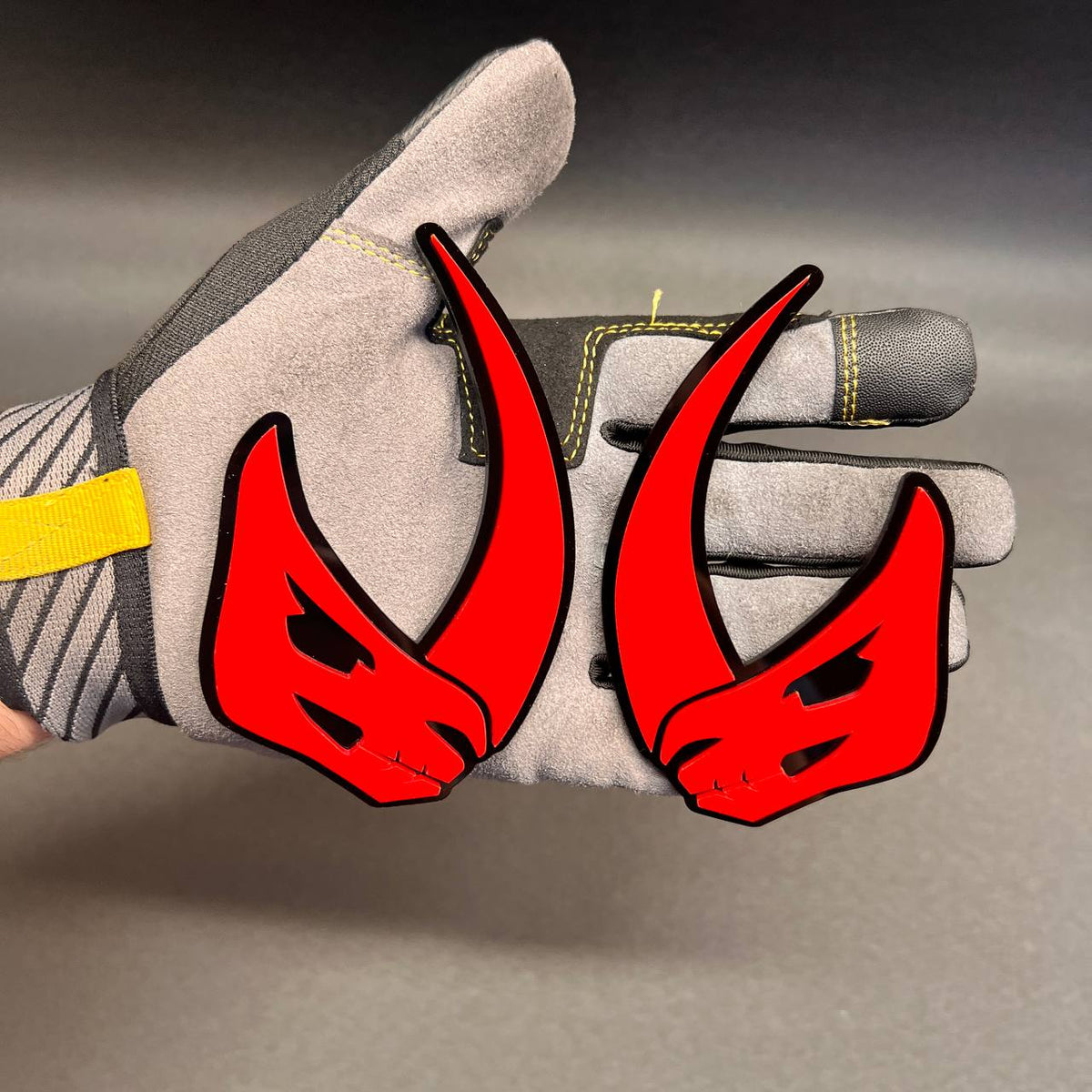 Red and black horned Mudhorn emblem badge for vehicle exterior