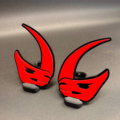 Red acrylic Mudhorn badge with glossy black base for vehicles