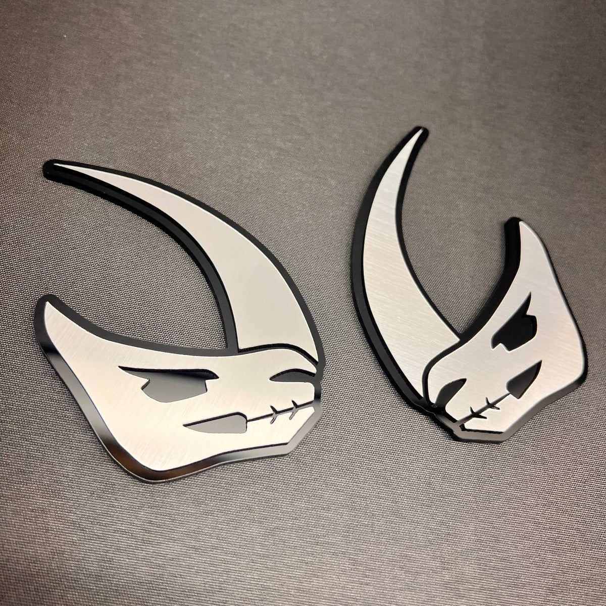 Custom Mudhorn car emblem and fender badge in brushed silver and black