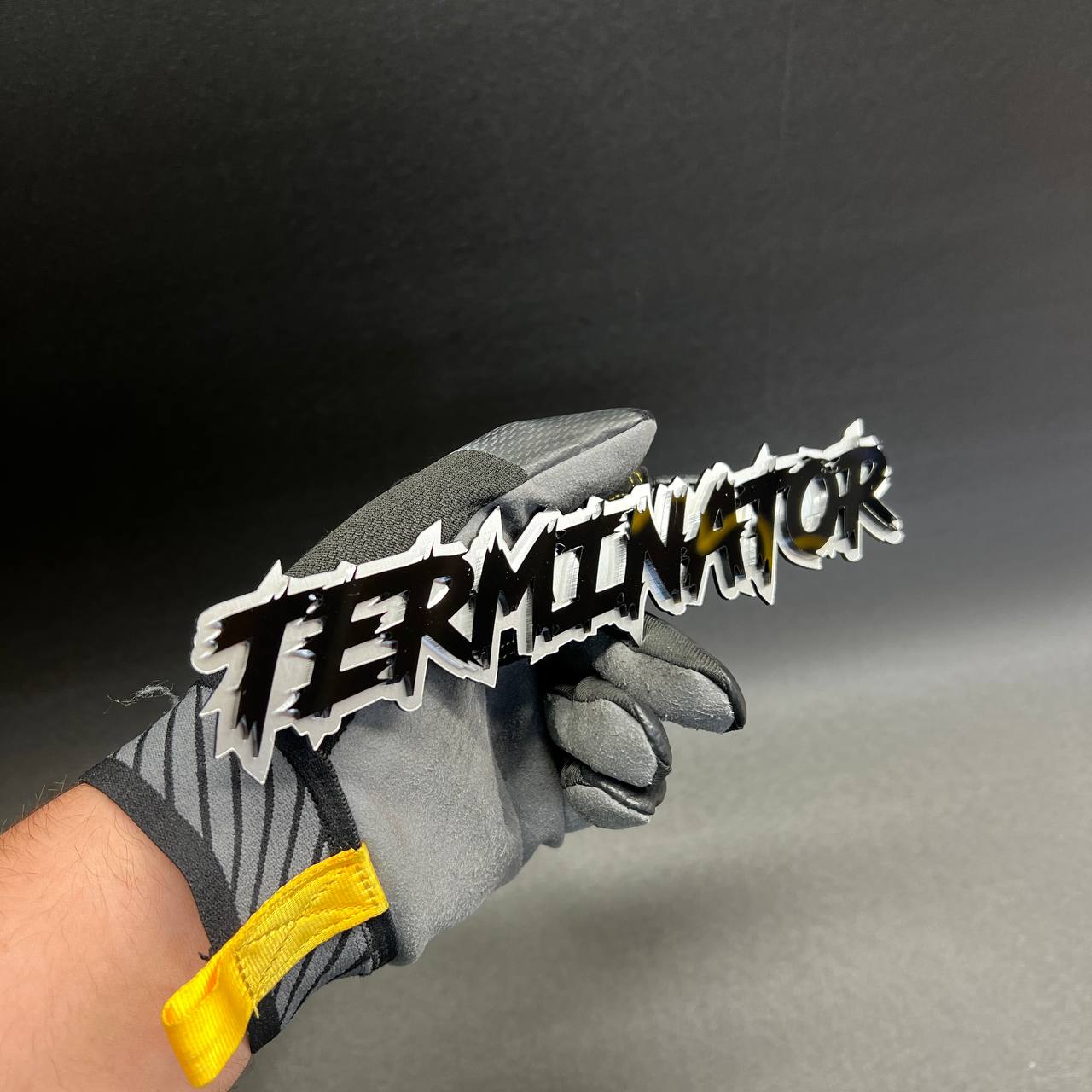 Black and silver TERMINATOR style text badge for offroad trucks and performance vehicle accessories