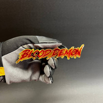 Custom Blood Demon text badge in red mirror acrylic with gold outline for truck and muscle car styling
