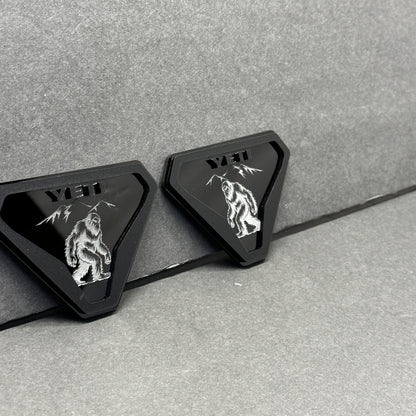 Silver black Yeti walking creature emblem with mountain design