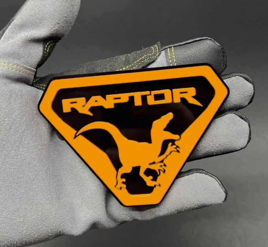 red black car badge on Toyota Tundra Tacoma truck styling
