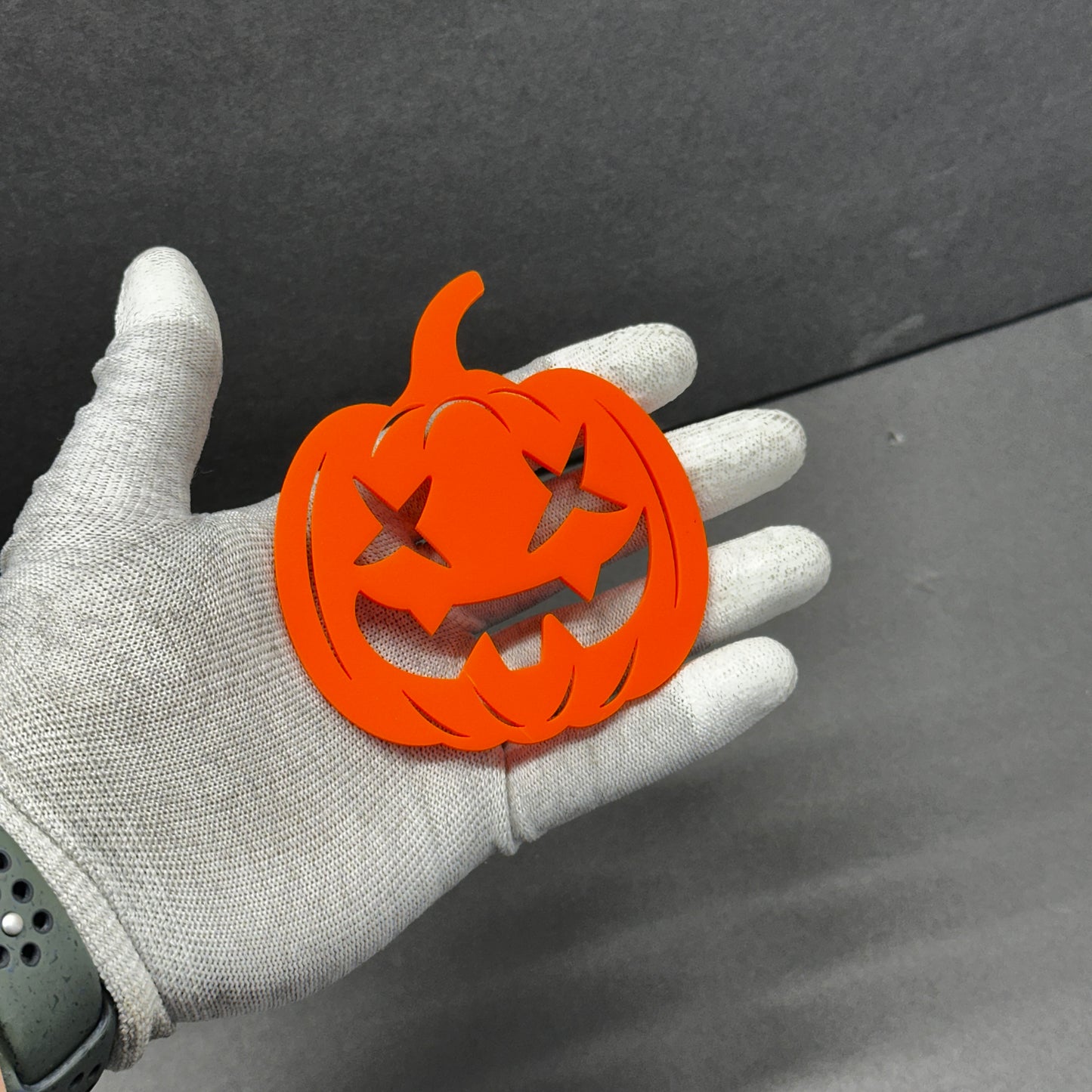 Jack-o-lantern orange car emblem for Halloween vehicle decoration