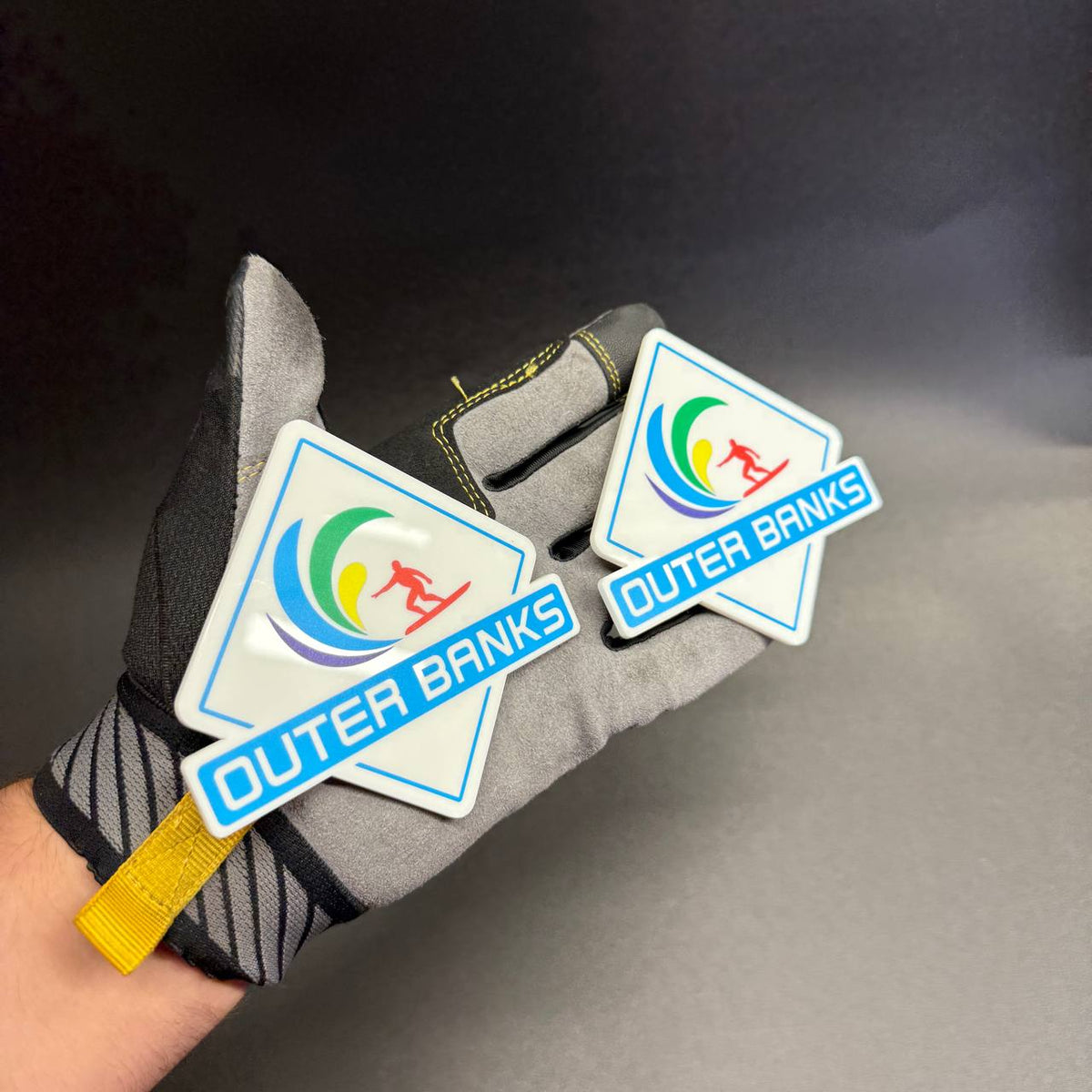 Outer Banks Bronco fender emblem pair with white background and colorful UV print