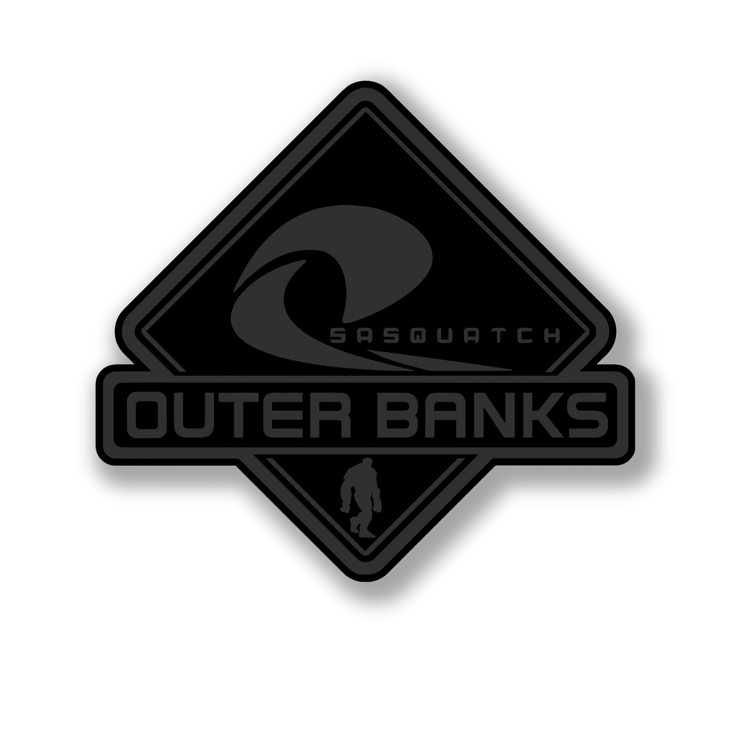 Engraved Outer Banks Sasquatch fender badge with durable multicolor finish.