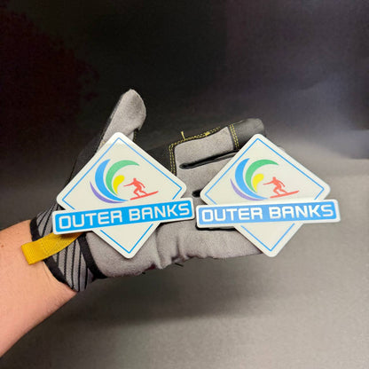 Pair of Outer Banks Bronco Sport fender badges with colorful surfing design