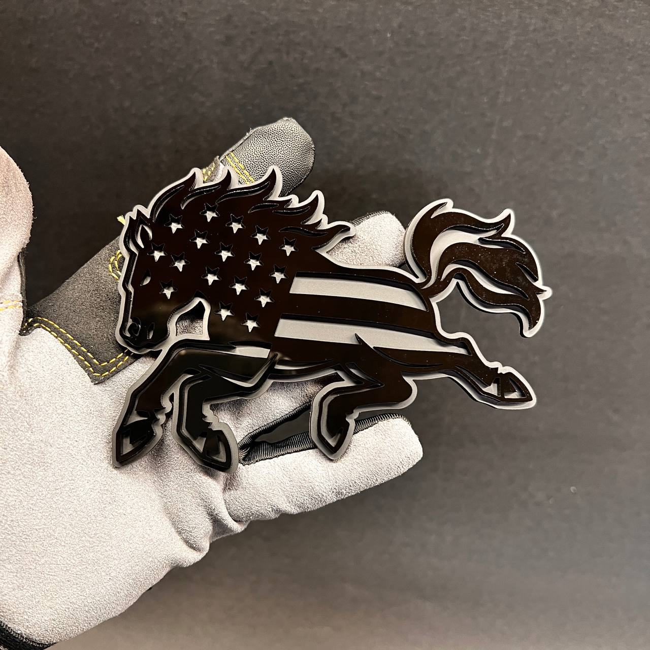 Black and silver American flag horse emblem with glossy finish
