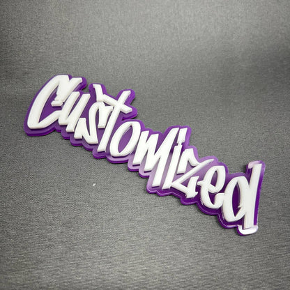 Custom graffiti font car badge in purple and white acrylic finish