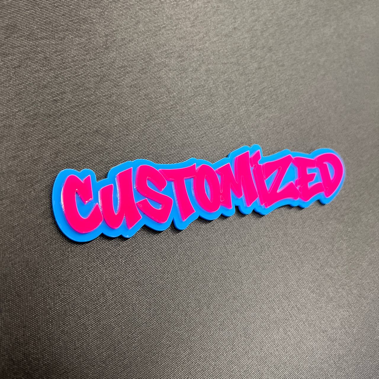 Handmade personalized graffiti font badge with layered color design