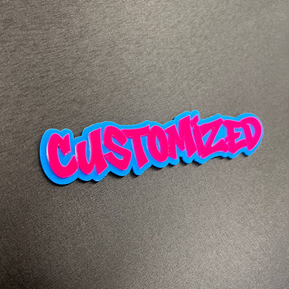 Handmade personalized graffiti font badge with layered color design