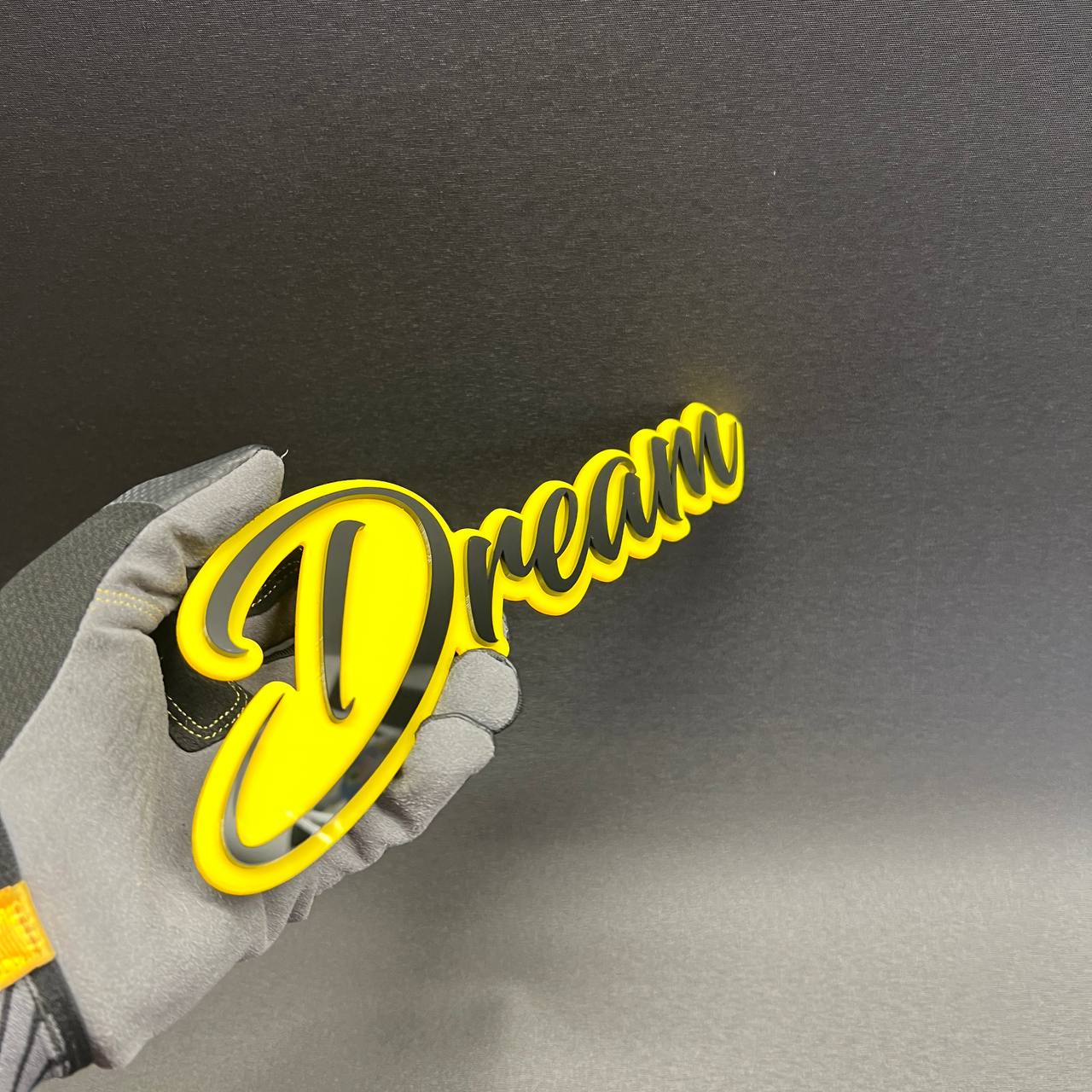 Yellow and black Dream script acrylic car badge emblem for Ford F150 truck customization