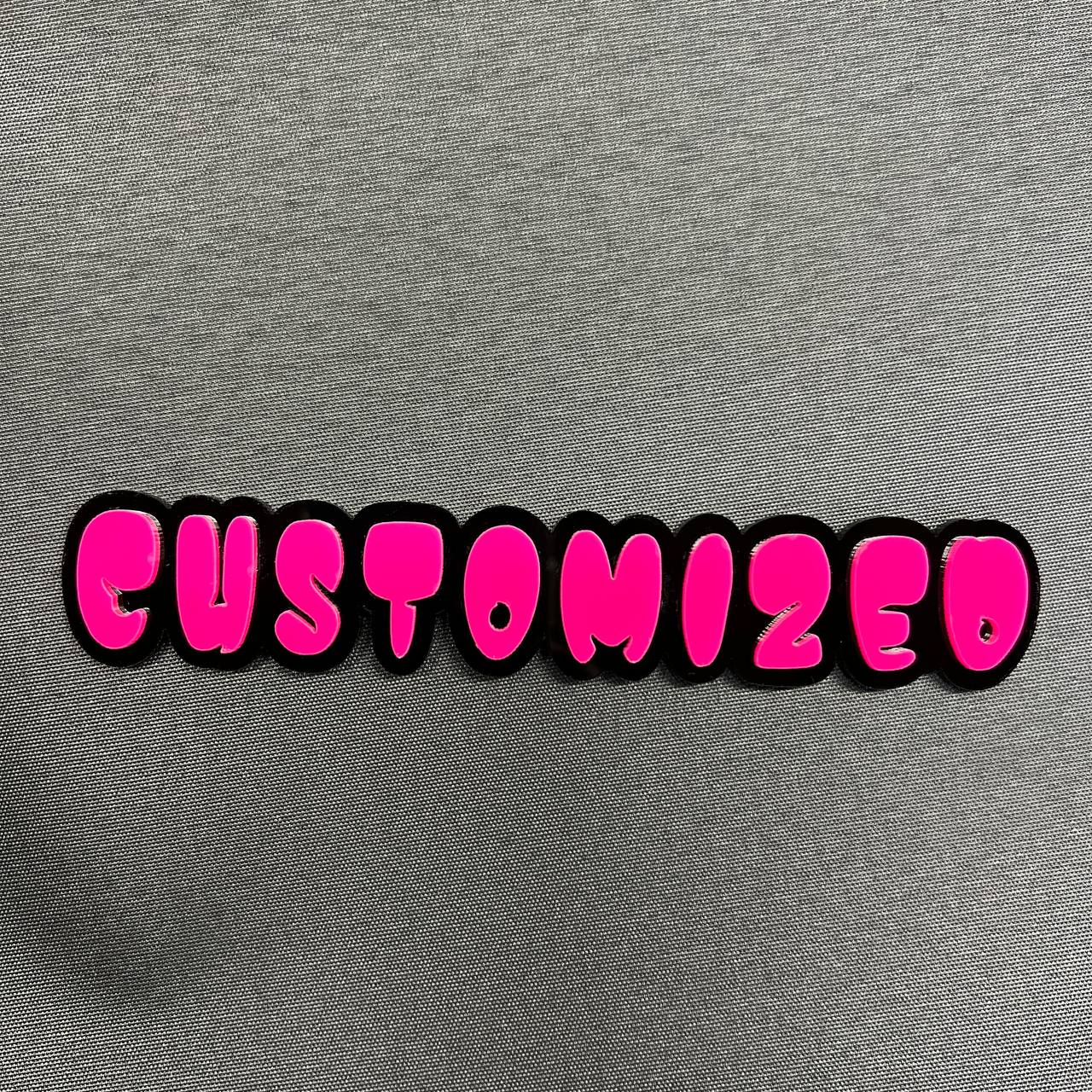 Custom pink graffiti badge with black outline for fender or tailgate