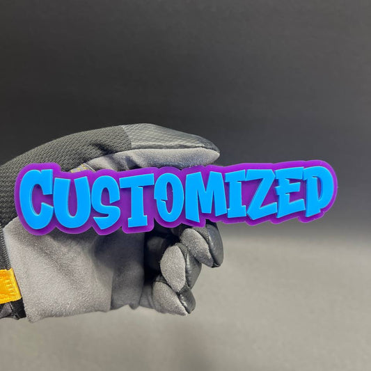 Custom made graffiti badge car accessory with layered color design