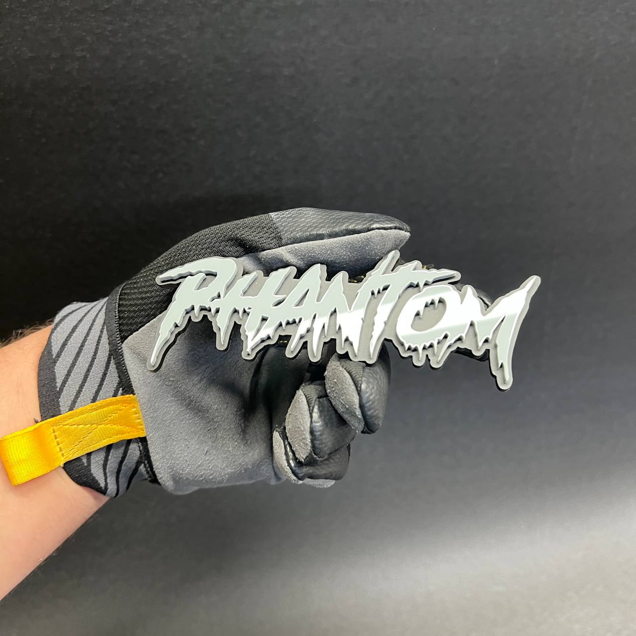 Phantom performance style car badge with layered acrylic construction