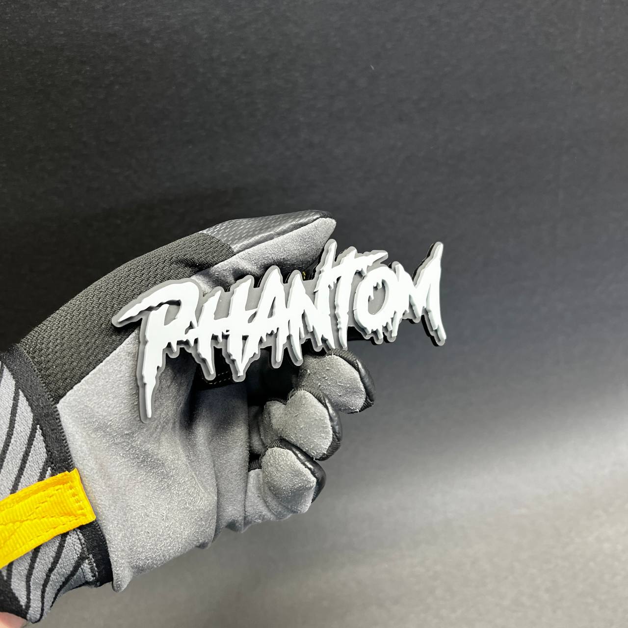 Custom acrylic Phantom badge decal with bold gothic horror inspired lettering