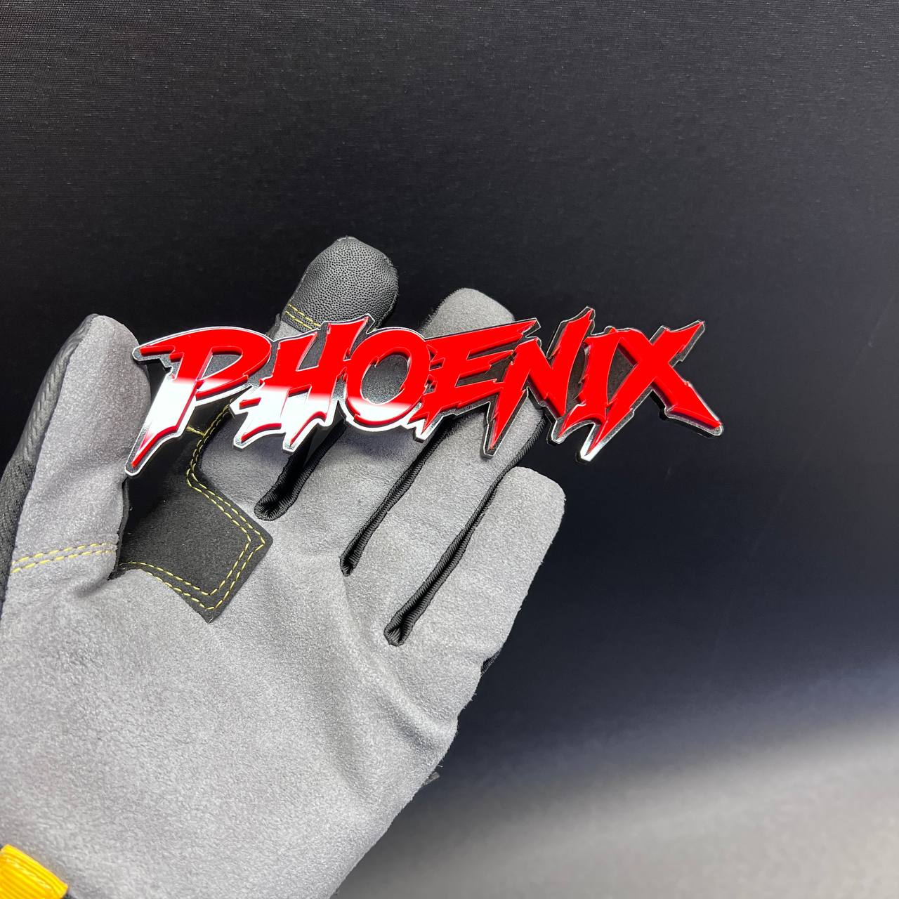 Custom Phoenix fender emblem featuring sharp performance lettering