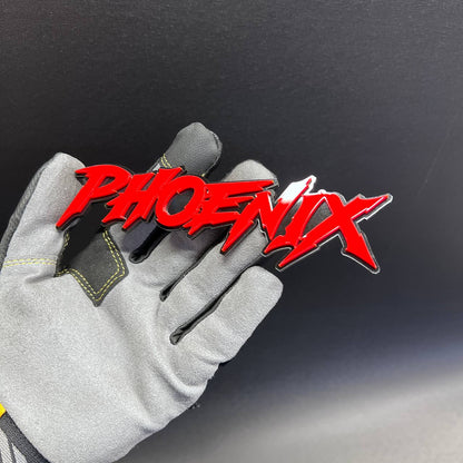 Custom Phoenix car badge in aggressive red script design
