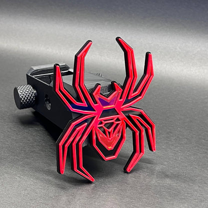 Stylish Black Widow hitch cover badge with layered mirror acrylic spider design.