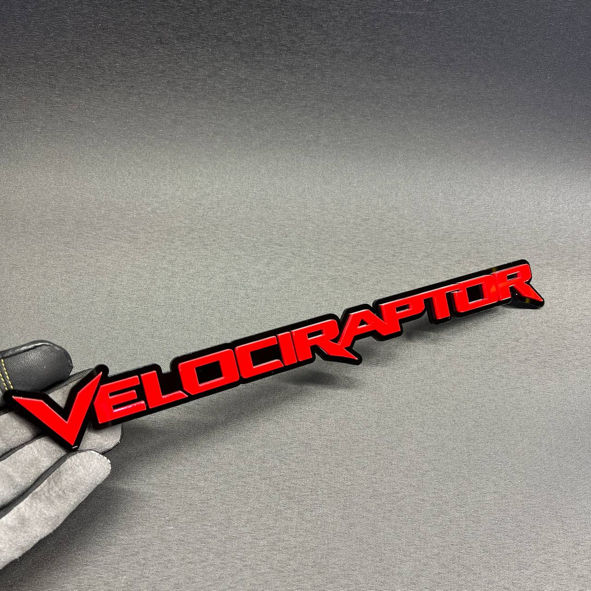 Velociraptor automotive badge emblem for Ford Bronco Raptor, F-150 and custom off-road vehicles