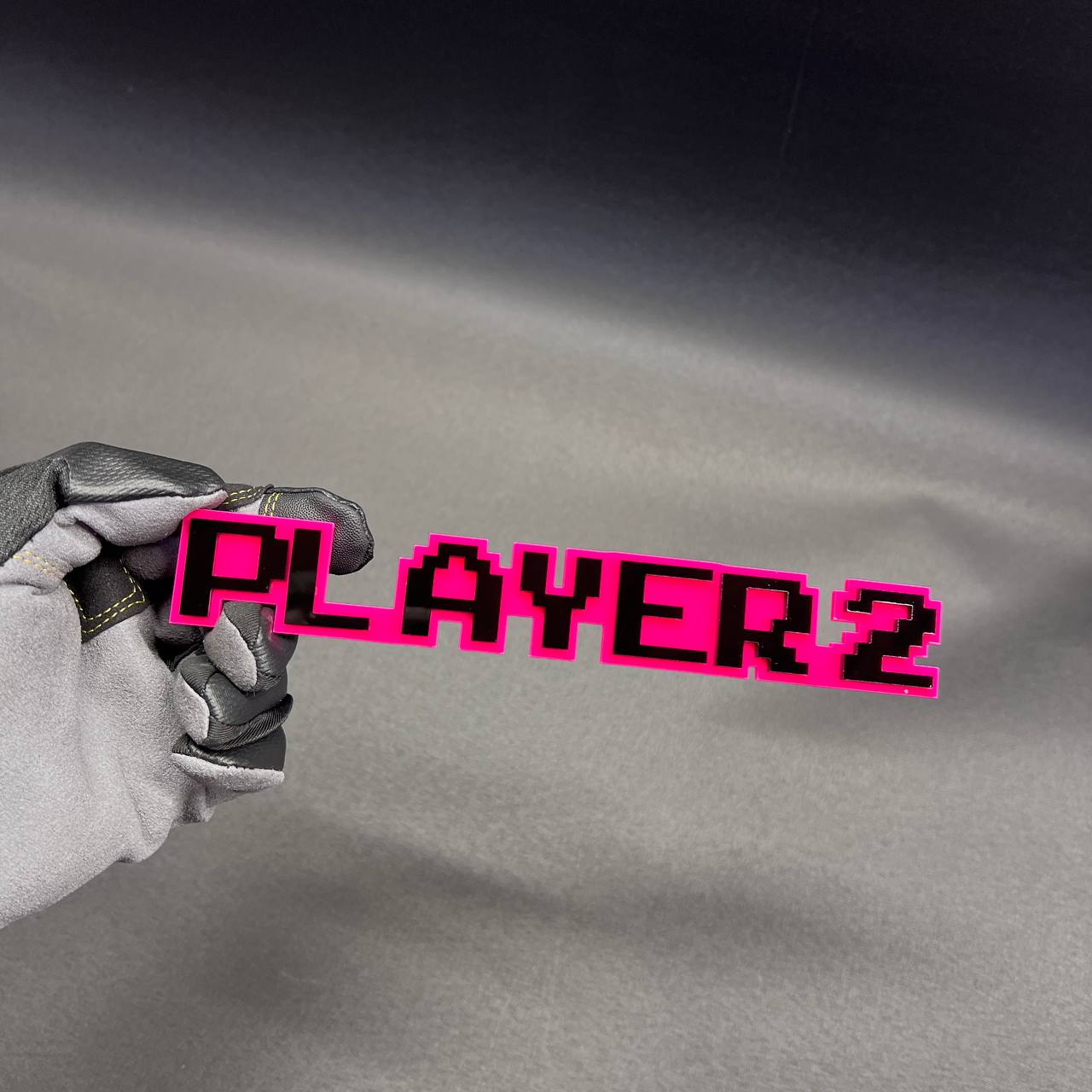 PLAYER 2 text emblem in retro 8-bit style for custom vehicle decoration.