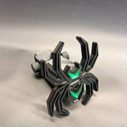 Custom black and green spider trailer hitch receiver cover with detailed layered construction.