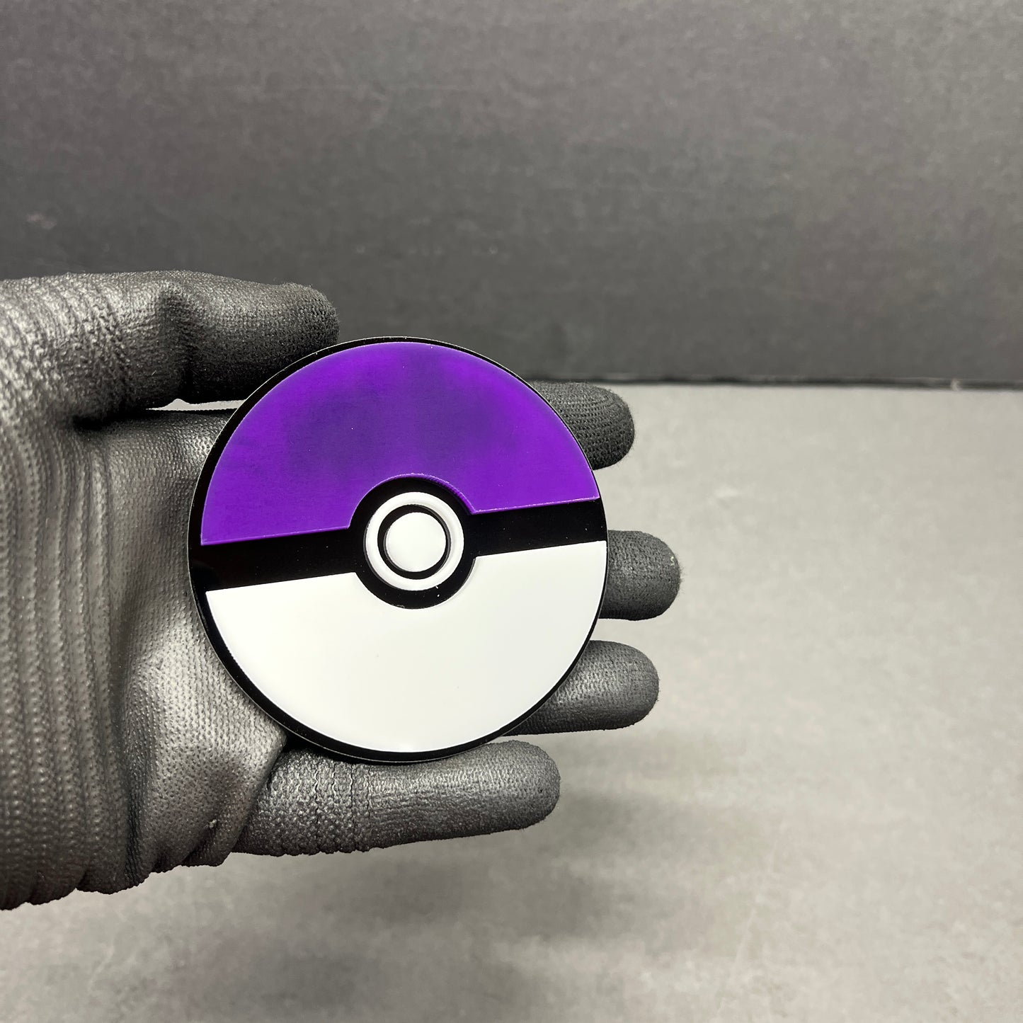 Gaming inspired car badge in purple white and black acrylic finish