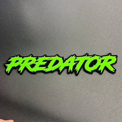 Predator automotive badge in neon green and black designed for car truck or SUV fender installation