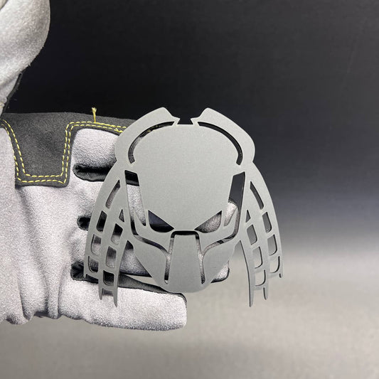 Predator car badge fender emblem in matte gray acrylic with detailed hunter mask design