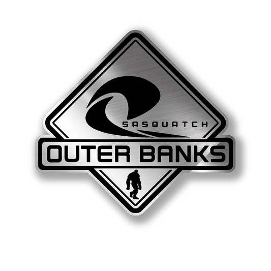 Outer Banks Sasquatch engraved car badge in brushed silver and black finish.