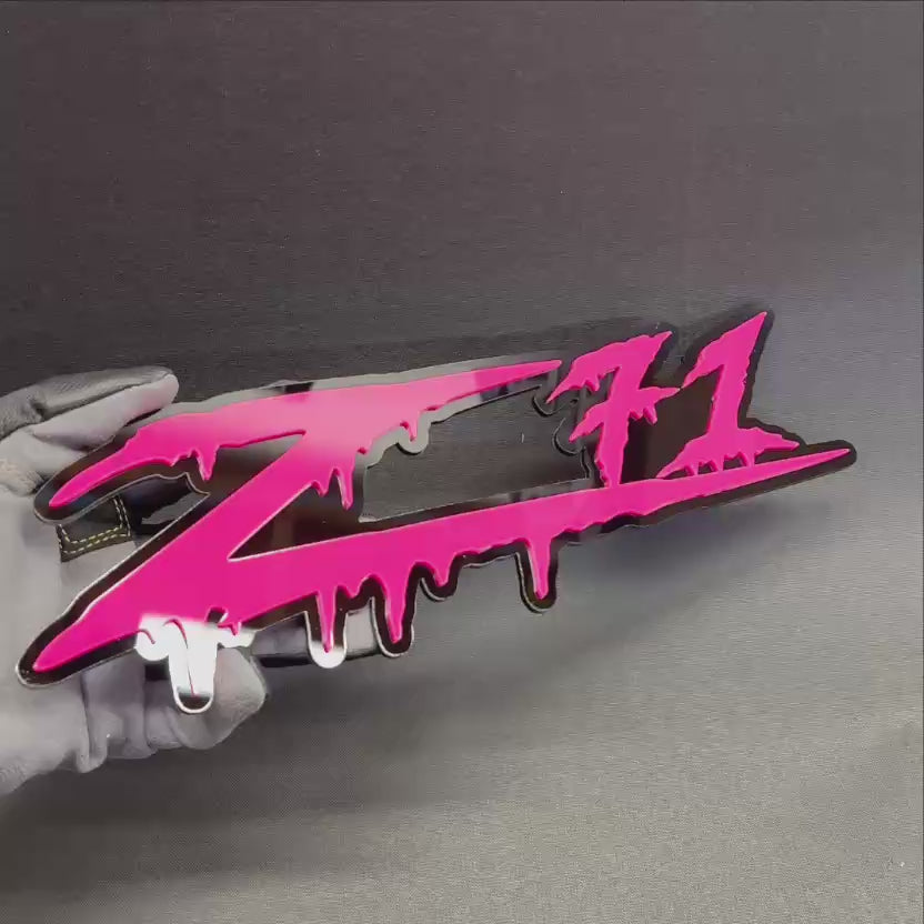 Custom Z71 drip style car badge with glossy black base and bright pink top