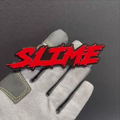 Custom SLIME text car emblem in red and black layered design