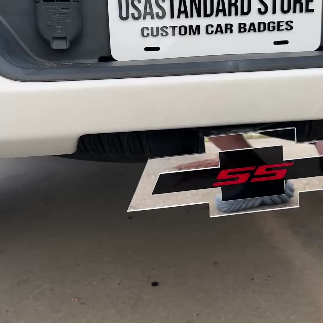 Chevrolet SS Bowtie hitch cover mounted on a rear truck receiver